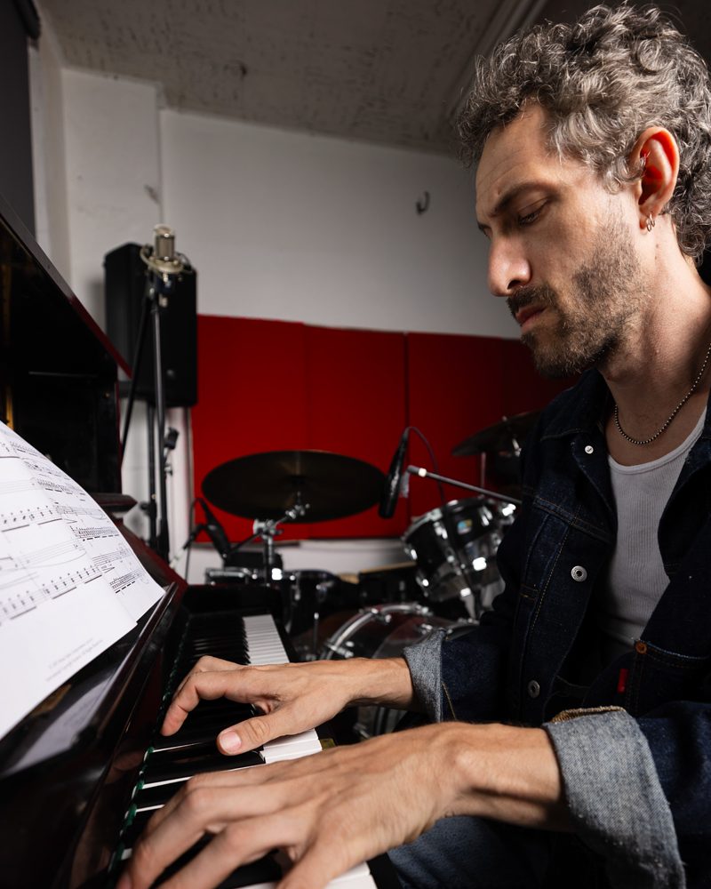 Producer at the keys in the studio