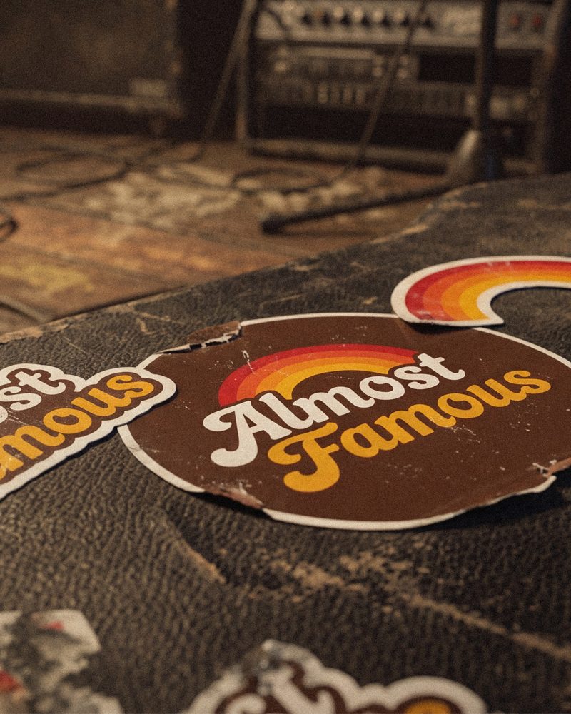 Almost Famous stickers on a road case