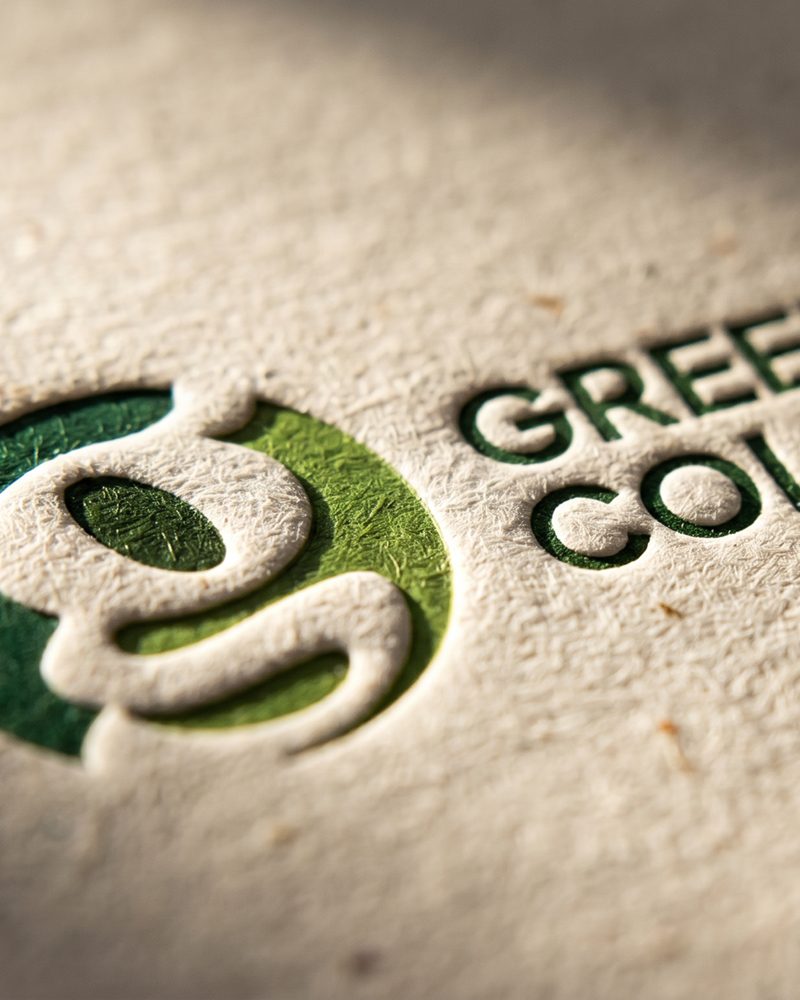 Embossed brand mark on textured card