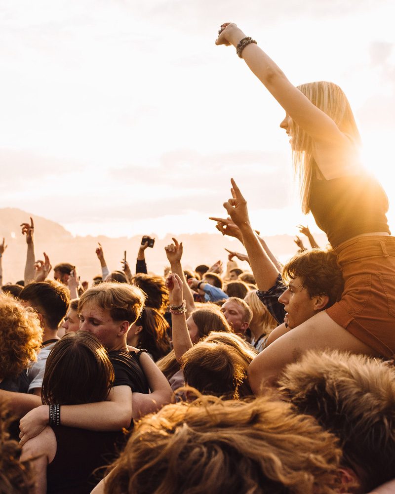Festival crowd at golden hour